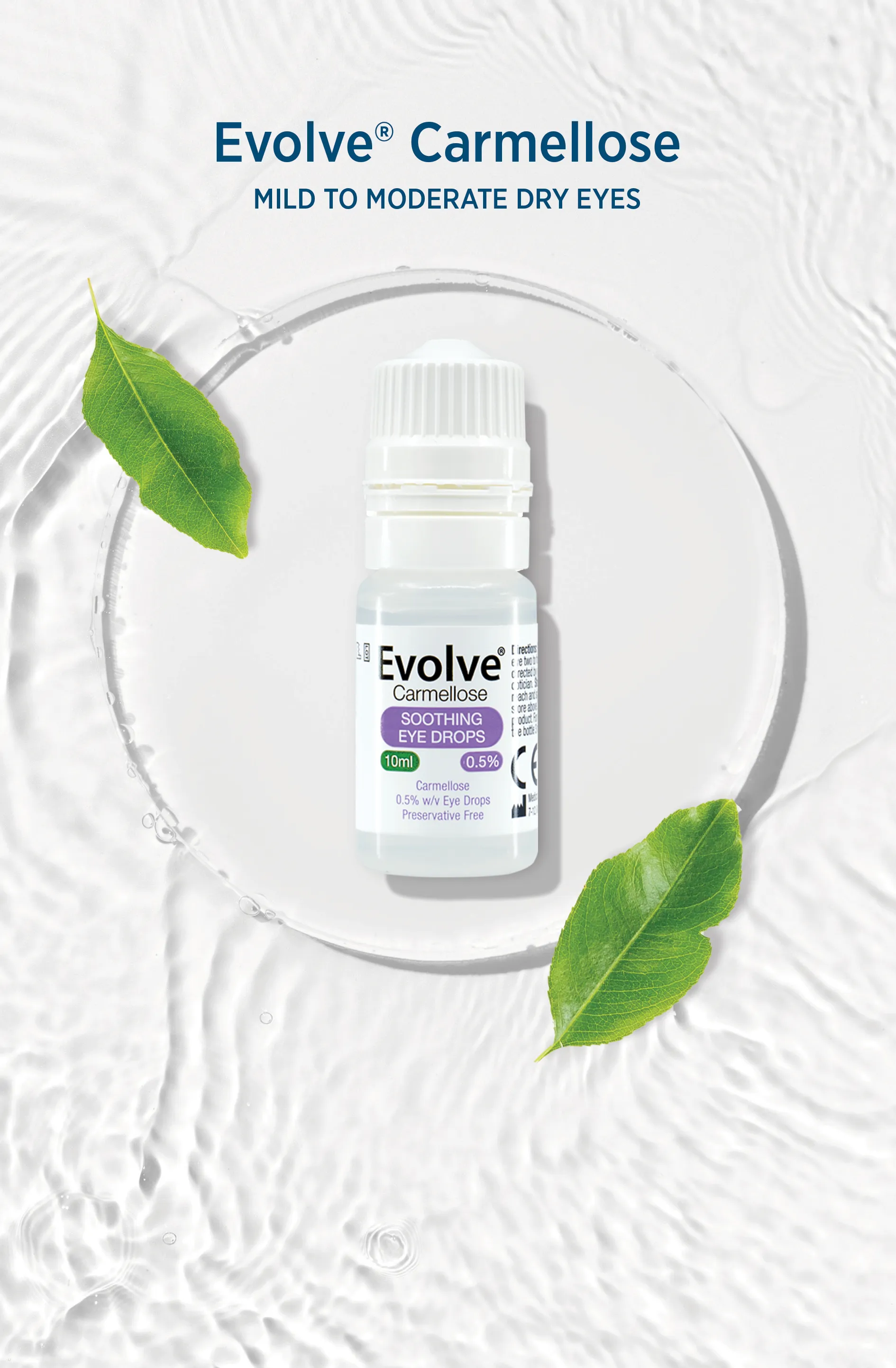 Evolve Carmellose bottle resting on a glass plate with green leaves