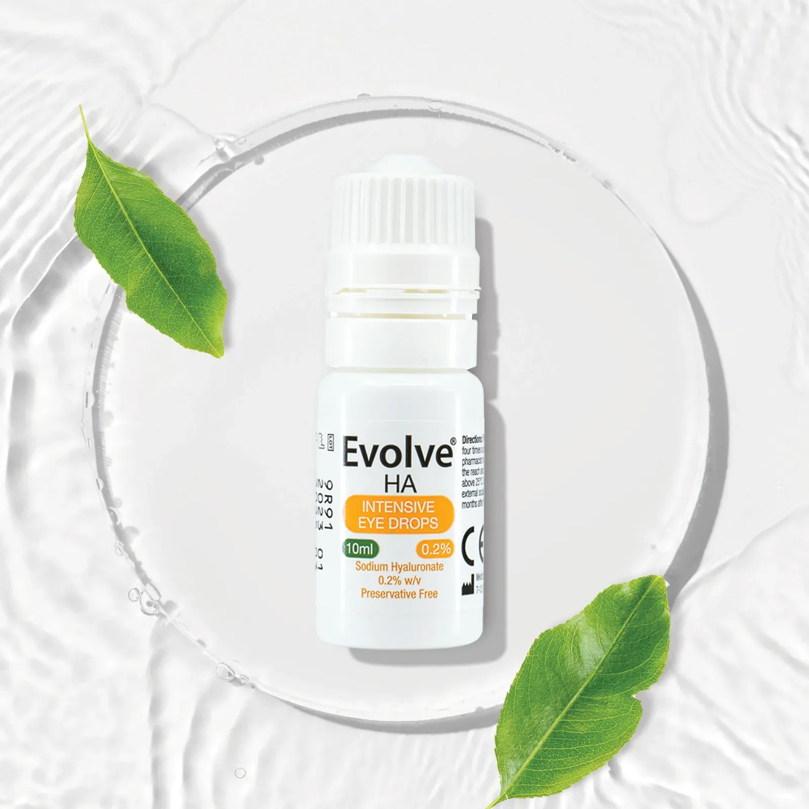 Evolve HA bottle resting on a glass plate with green leaves