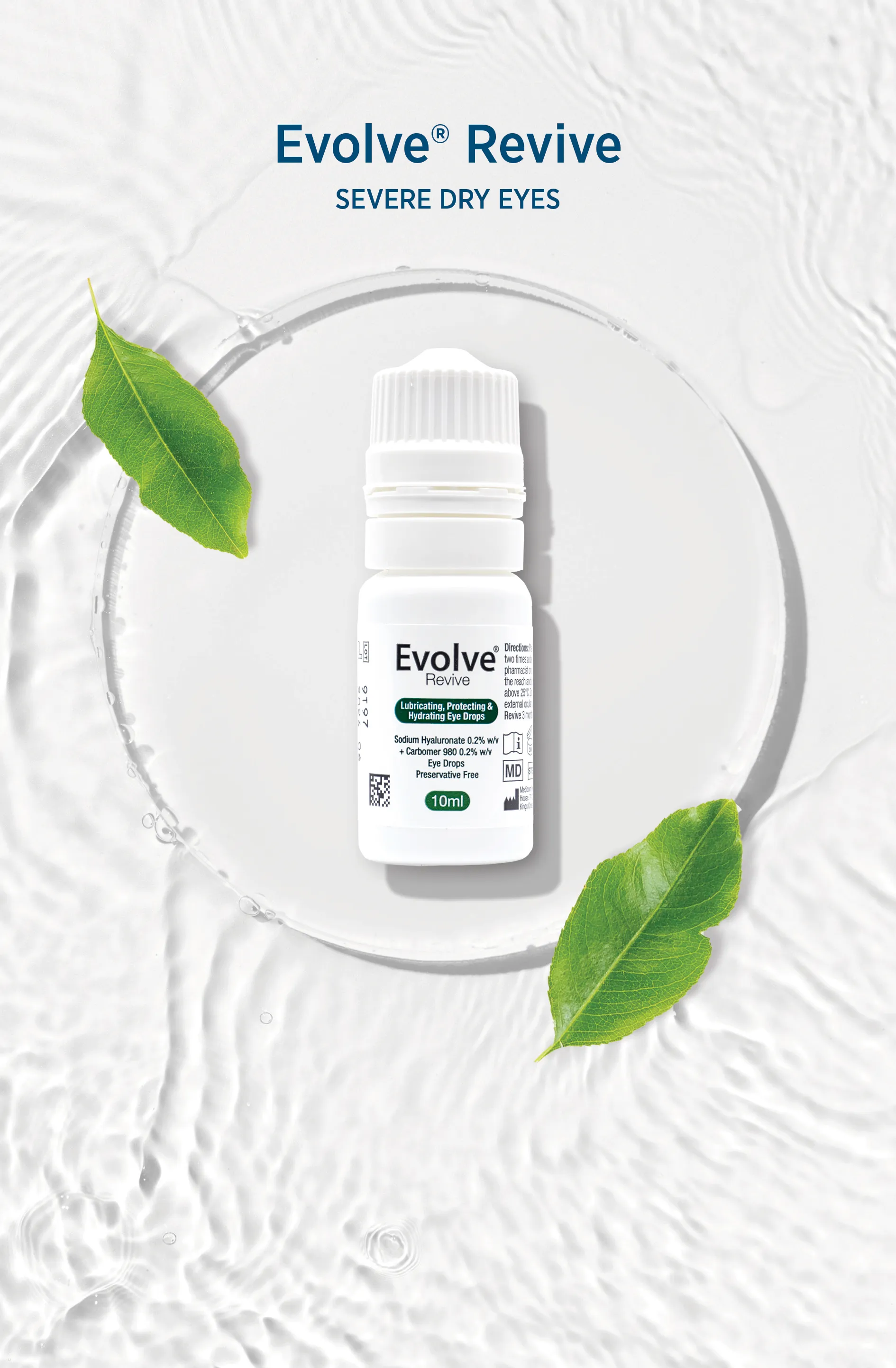 Evolve Revive bottle resting on a glass plate with green leaves