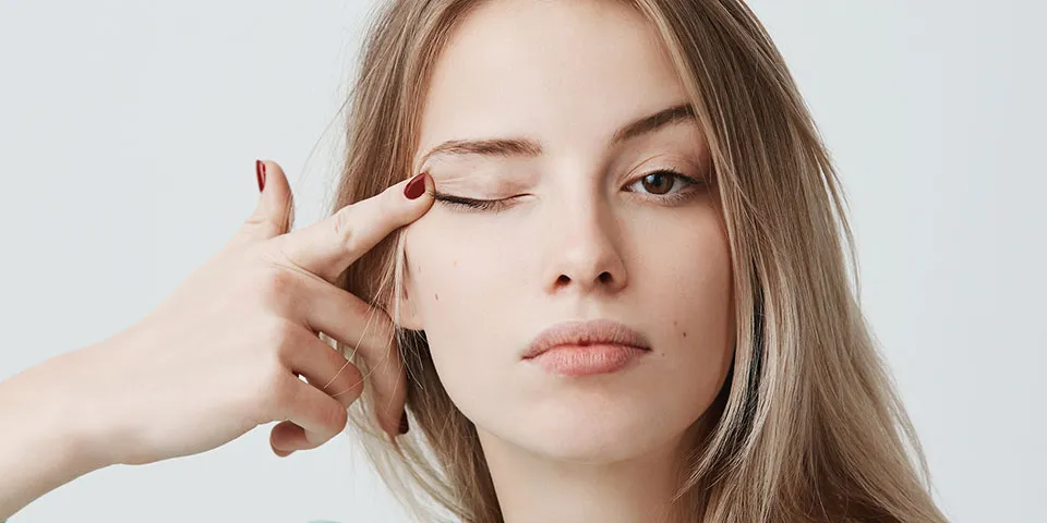 Comparison showing droopy eyelids and dry eye symptoms