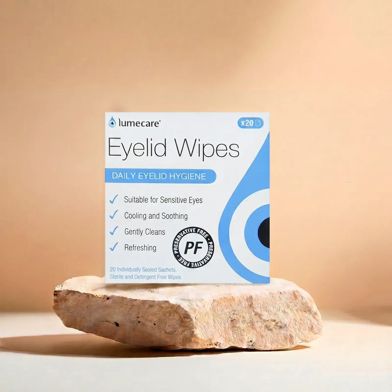 Lumecare Eyelid Wipes carton on a stone podium